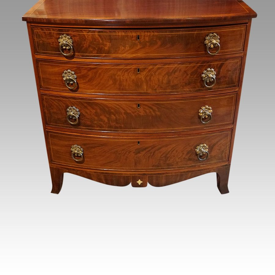 Antique Regency mahogany bow front chest