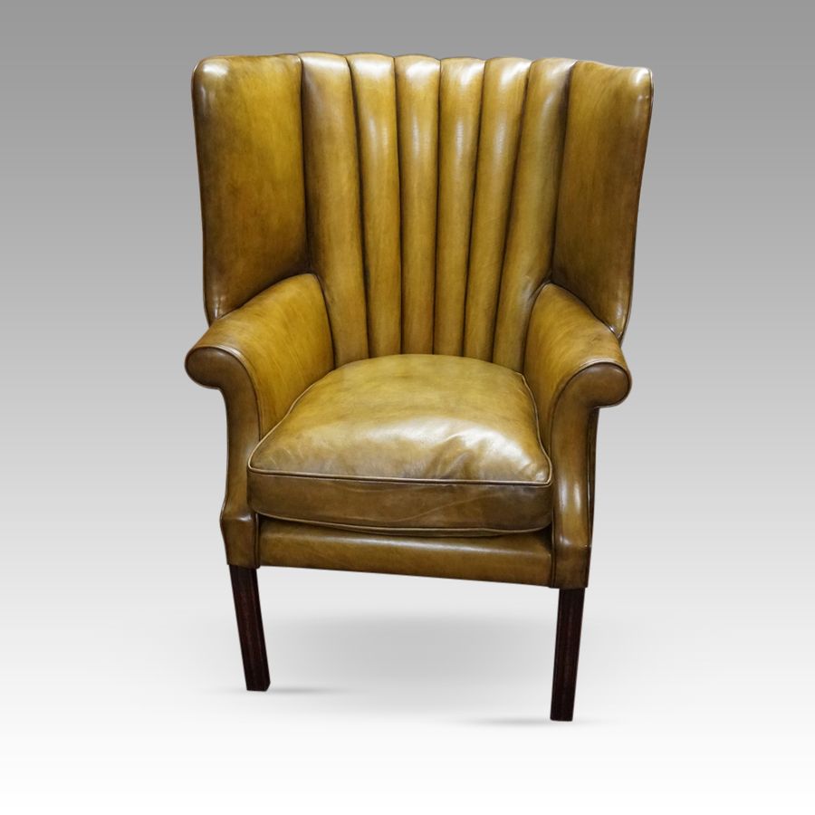 19thc. barrel back leather wing chair