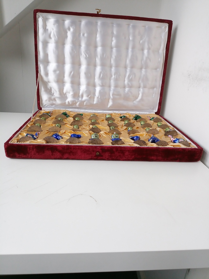 A rare Indian metal and Polychromatic enamel chess set, Mid 20th Century