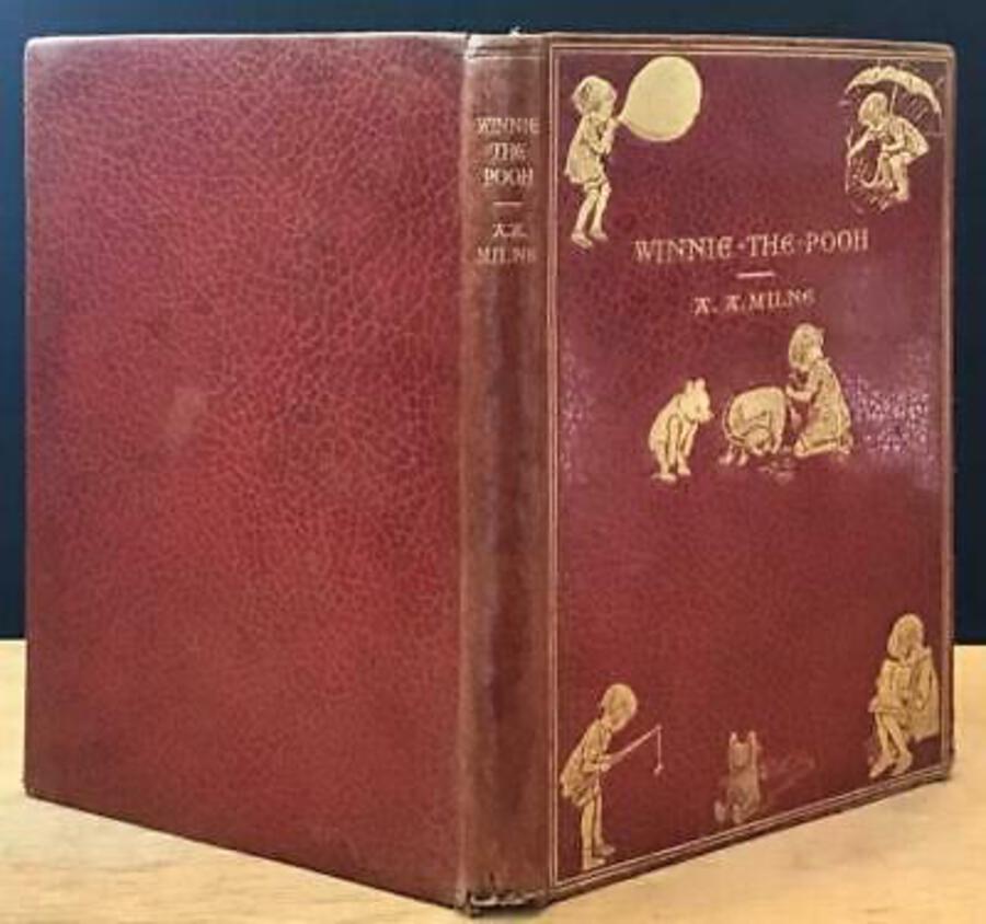 1928 WINNIE THE POOH BY A A MILNE RARE PUBLISHER’S FULL LEATHER DELUXE BINDING