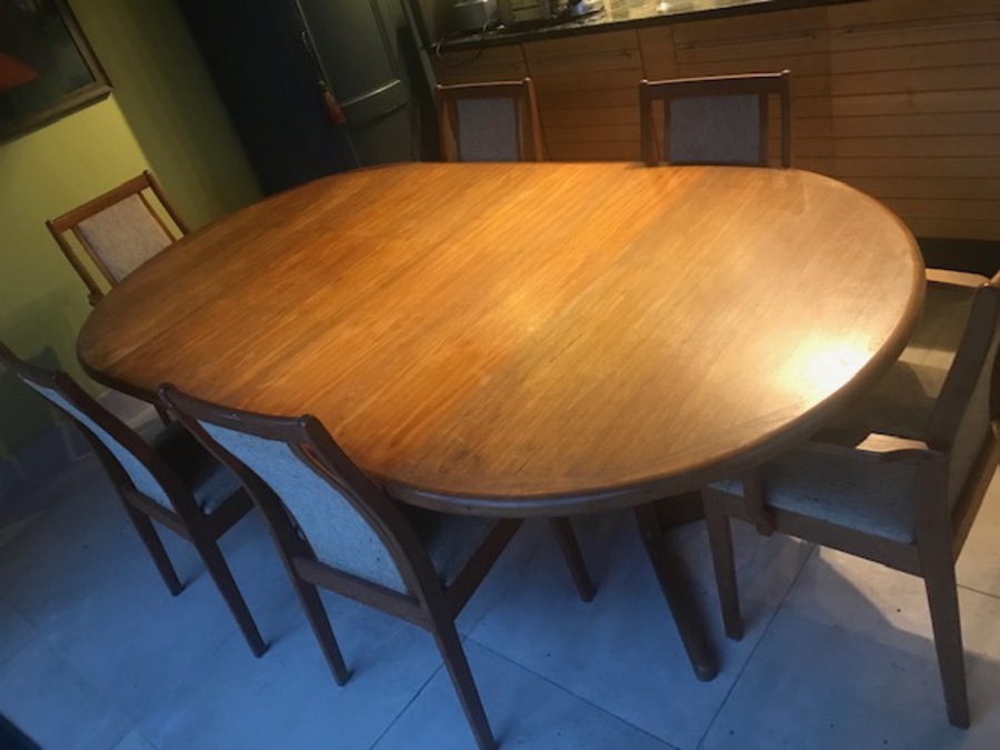 Mid-century Danish teak expandable table and six chairs