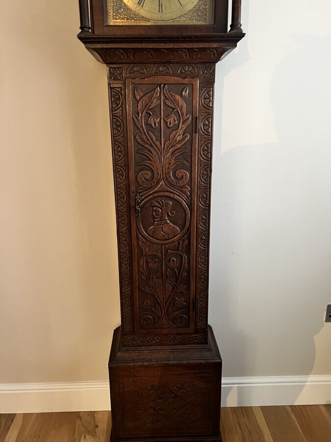 Antique Antique George III quality carved oak brass face longcase clock