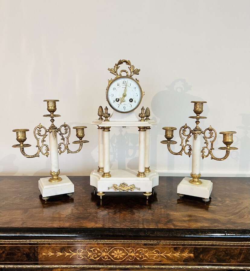 Antique Quality antique Victorian clock garniture with a pair of candelabras 