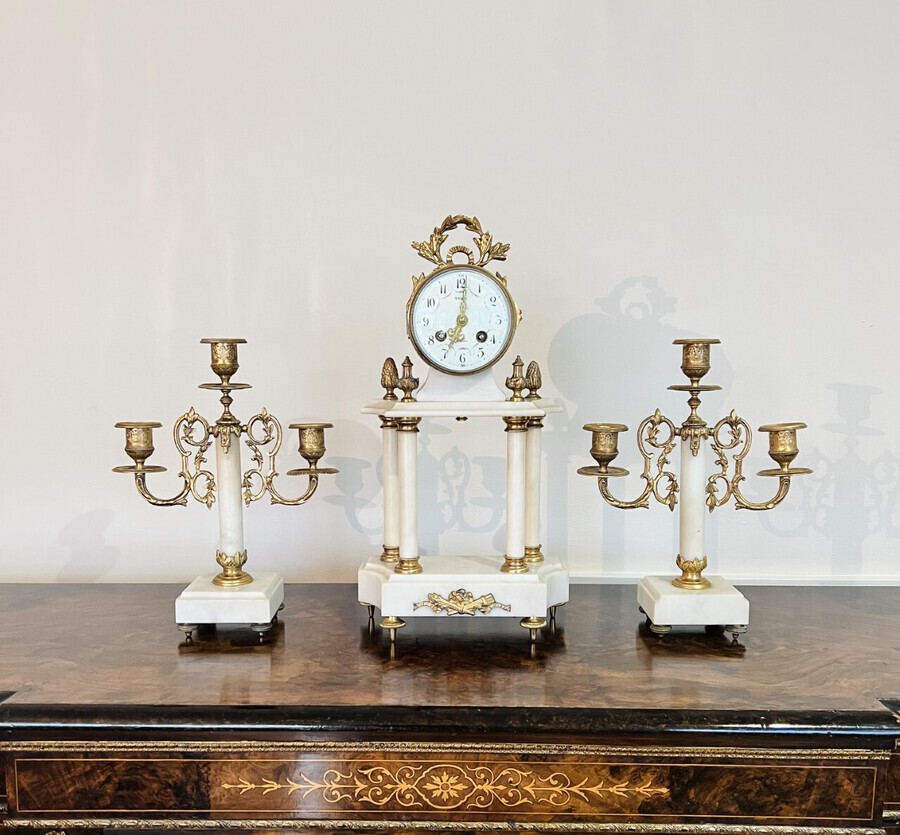 Antique Quality antique Victorian clock garniture with a pair of candelabras 
