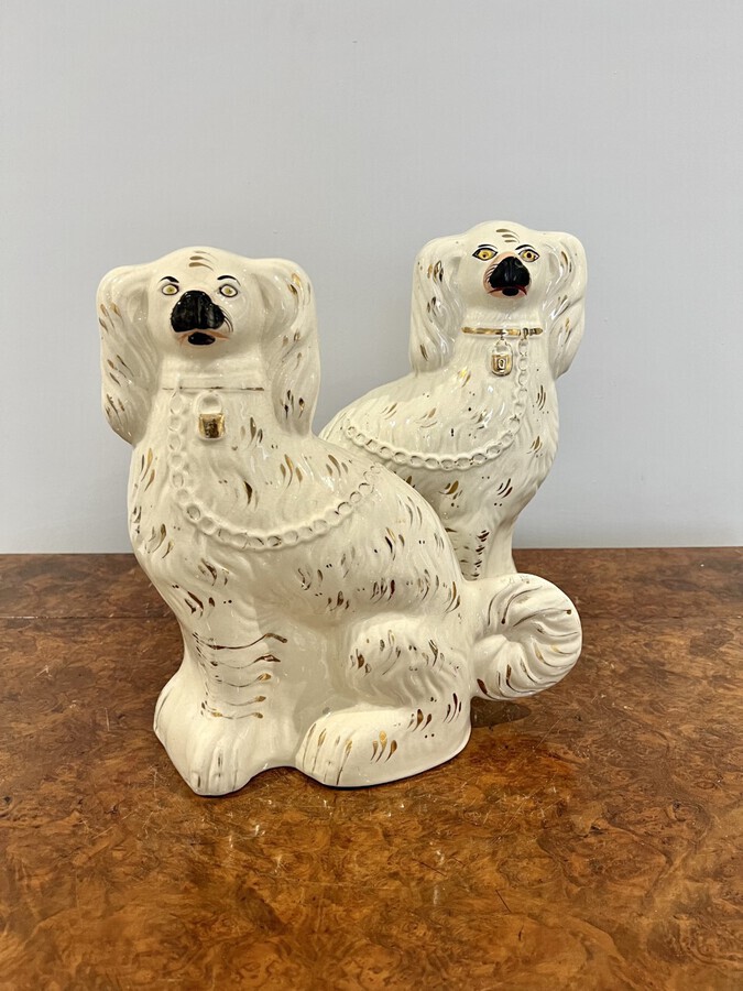 Antique Large pair of Victorian seated Staffordshire spaniel dogs