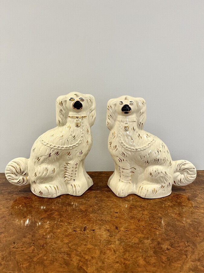 Antique Large pair of Victorian seated Staffordshire spaniel dogs