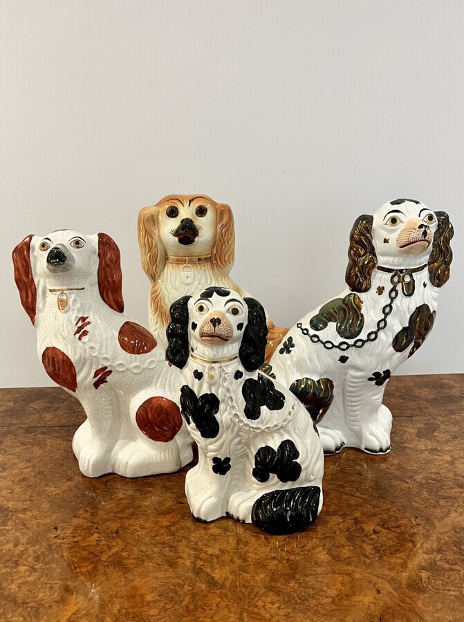 Collection of four antique quality hand painted Staffordshire dogs