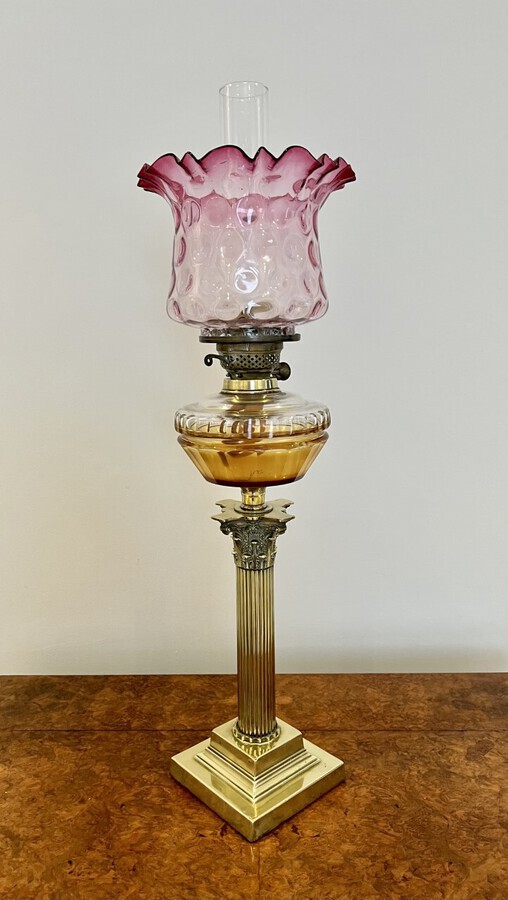Antique Fantastic quality antique Victorian brass oil lamp with a cranberry glass shade 