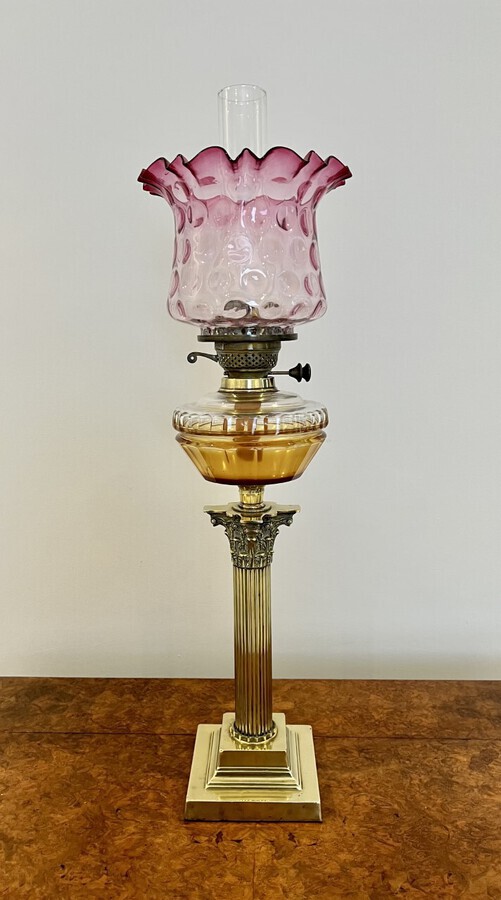 Antique Fantastic quality antique Victorian brass oil lamp with a cranberry glass shade 