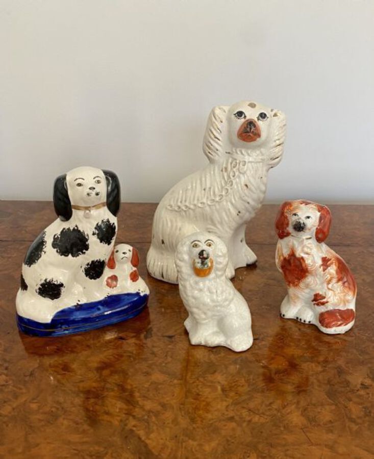 Antique COLLECTION OF FOUR ANTIQUE QUALITY STAFFORDSHIRE DOGS