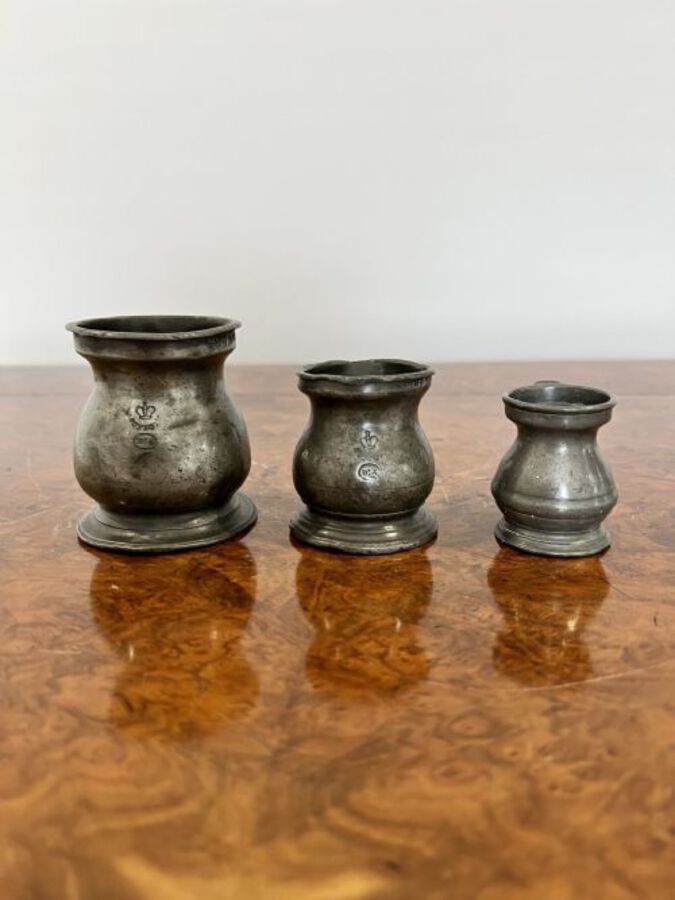Antique Set of three antique Victorian pewter measures marked VR