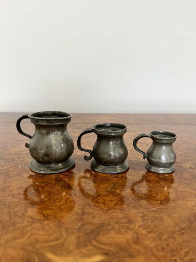 Antique Set of three antique Victorian pewter measures marked VR