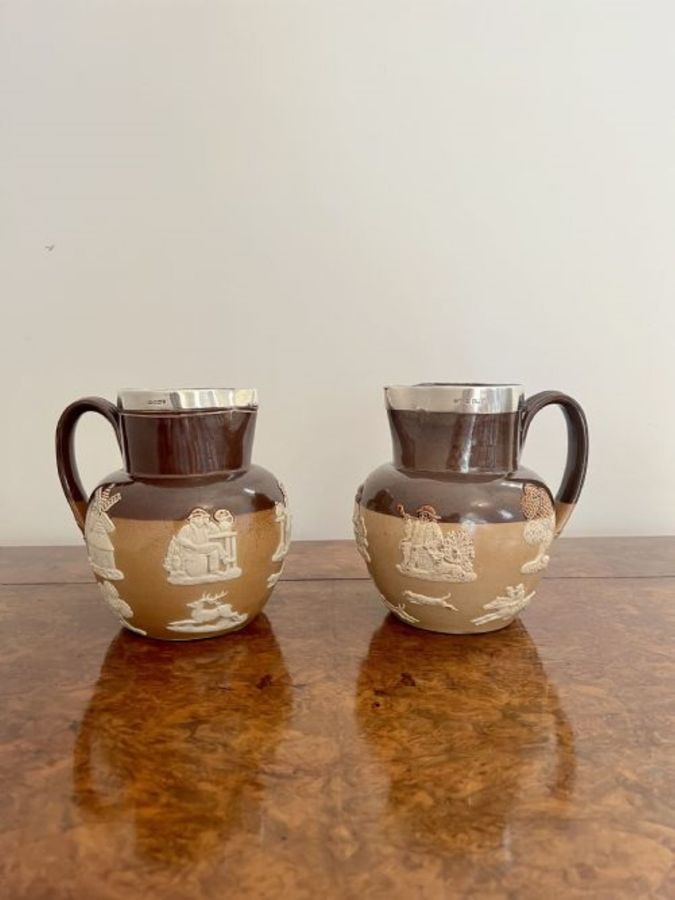 Antique Unusual pair of quality antique Doulton Lambeth harvest jugs with silver rims 