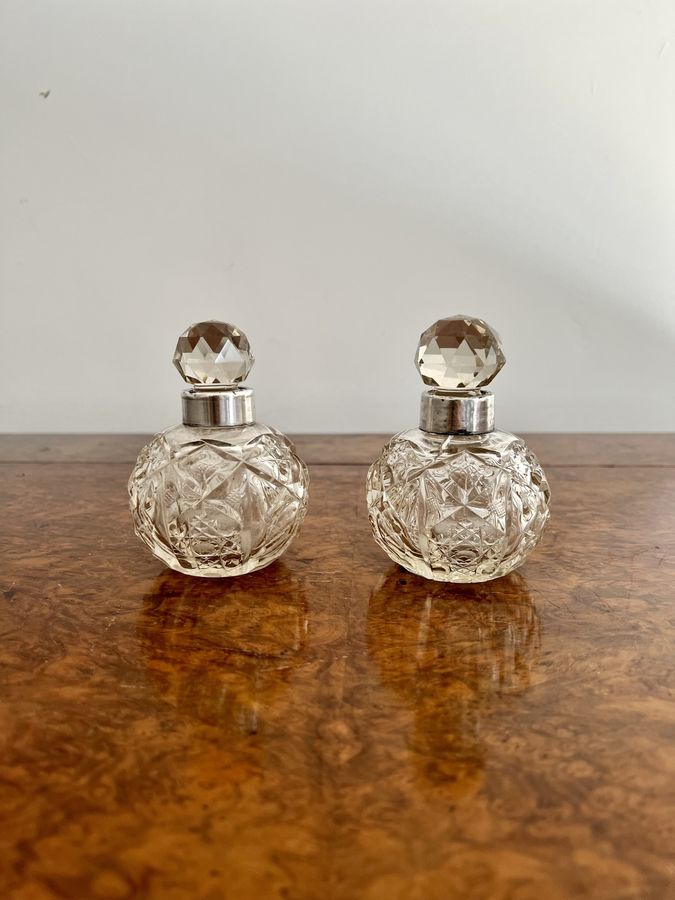 Quality pair of antique Edwardian silver collar & cut glass scent bottles
