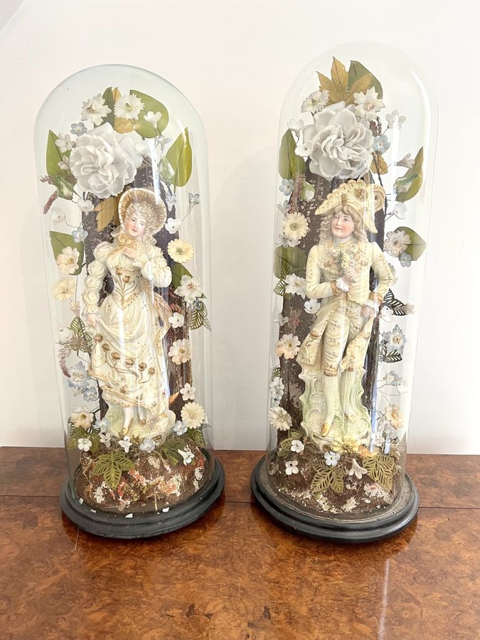 Antique Outstanding quality pair of antique Victorian continental figures with the original glass domes 