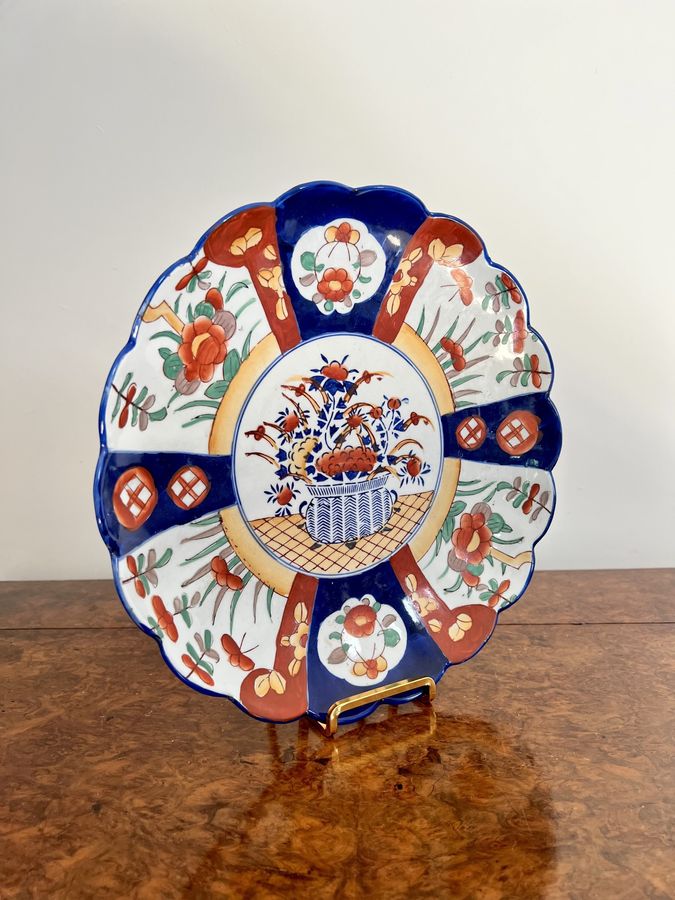 Antique Quality antique Japanese imari plate with a scallop shaped edge  