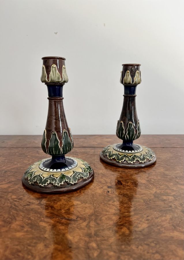 Antique Attractive pair of antique Royal Doulton candlesticks 