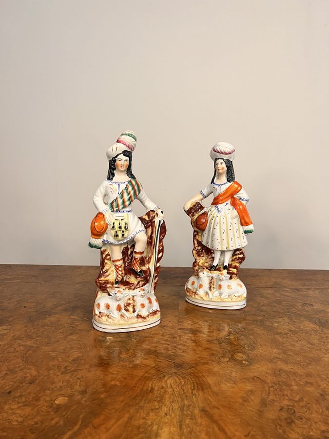 Quality pair of antique Victorian Staffordshire highland figures
