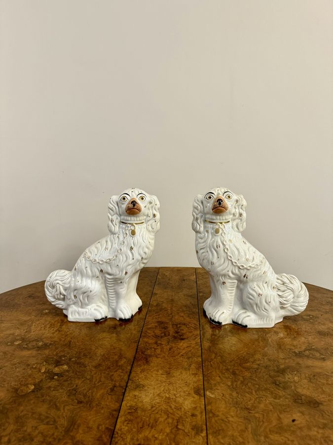 Antique Large pair of antique Victorian seated Staffordshire spaniel dogs