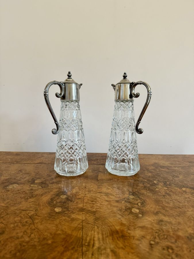 Stunning pair of antique Edwardian silver plated claret jugs