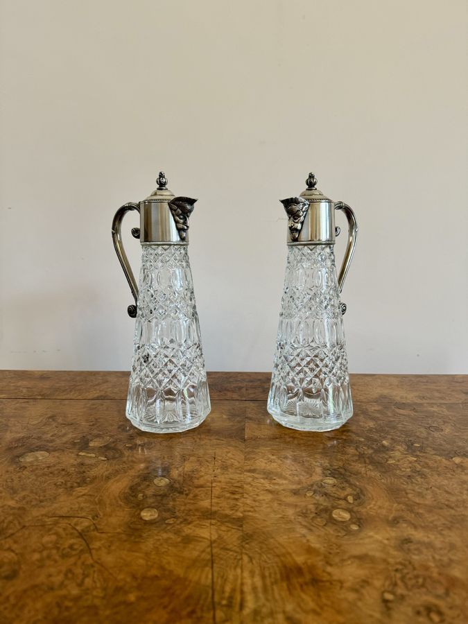 Antique Stunning pair of antique Edwardian silver plated claret jugs 