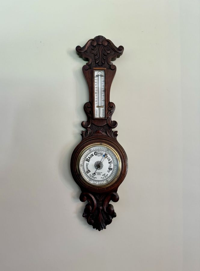 Lovely antique Edwardian carved oak aneroid barometer