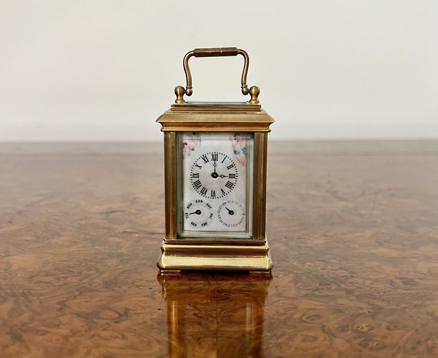 Antique Stunning antique miniature quality brass carriage clock with hand painted porcelain panels