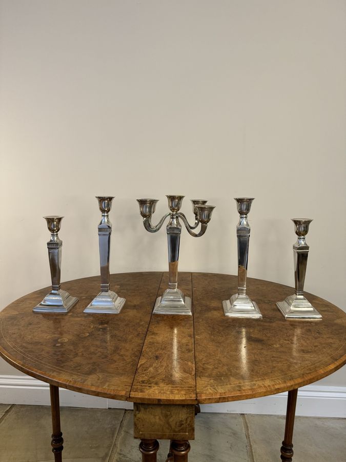 Stunning antique Edwardian suit of five silver plated candlesticks