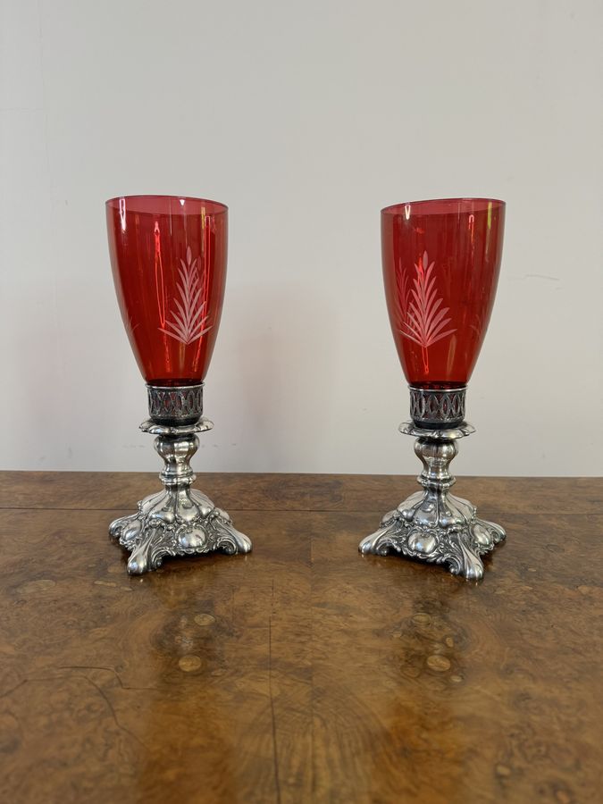 Antique Attractive pair of antique ruby glass and silver plated candle holders 