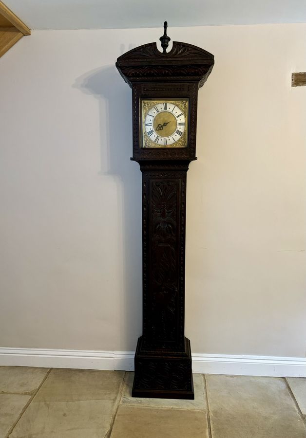 Antique George II quality carved oak brass face long case clock