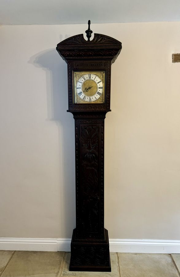 Antique Antique George II quality carved oak brass face long case clock 