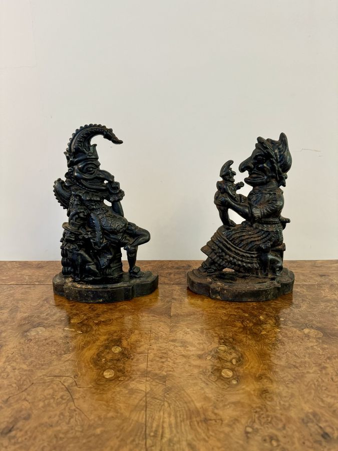 Antique Antique Punch and Judy cast iron door stops 