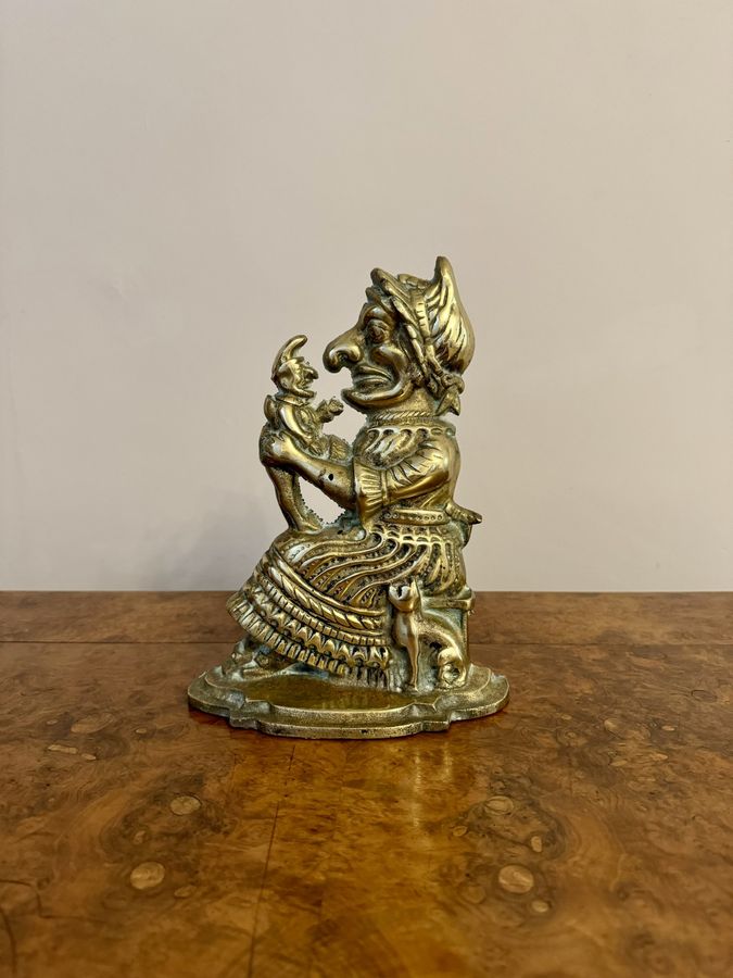 Antique Unusual brass antique doorstop of Mrs Punch 