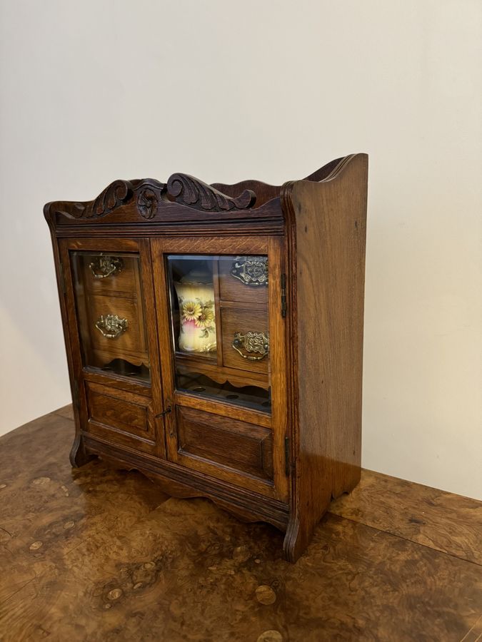 Antique Fantastic quality antique Edwardian carved oak smokers cabinet