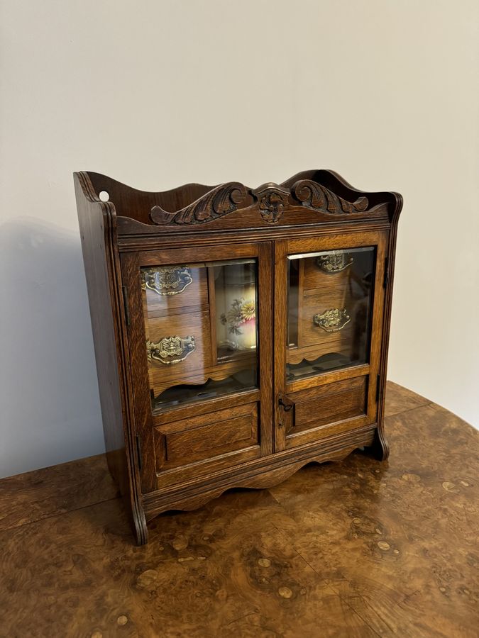 Antique Fantastic quality antique Edwardian carved oak smokers cabinet