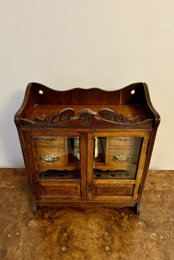 Antique Fantastic quality antique Edwardian carved oak smokers cabinet