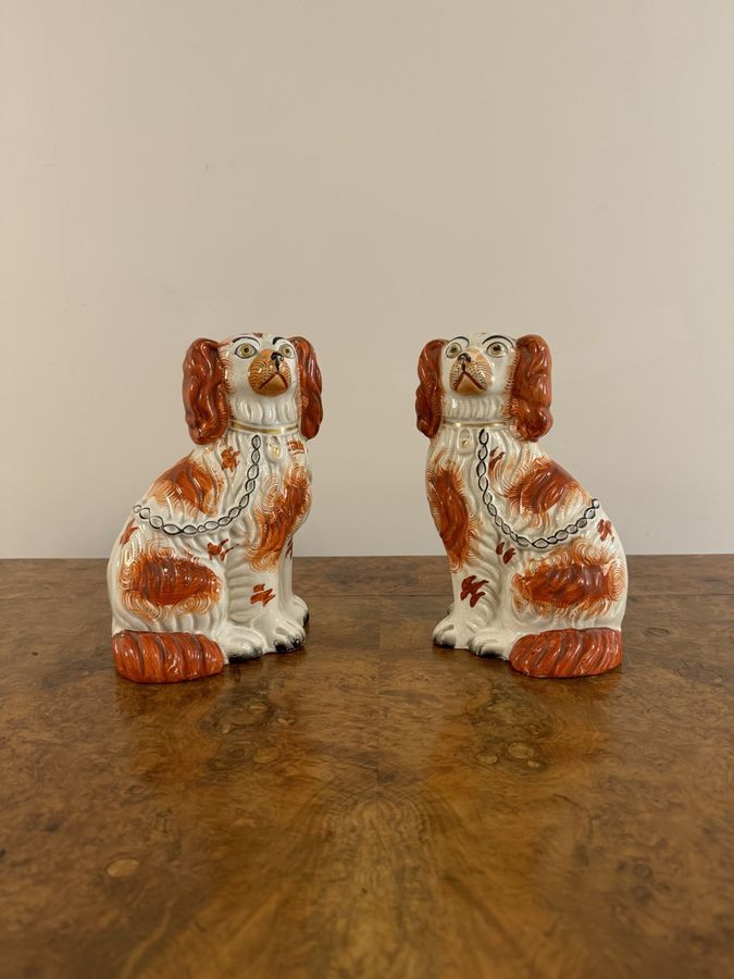 Wonderful pair of antique Victorian seated spaniels