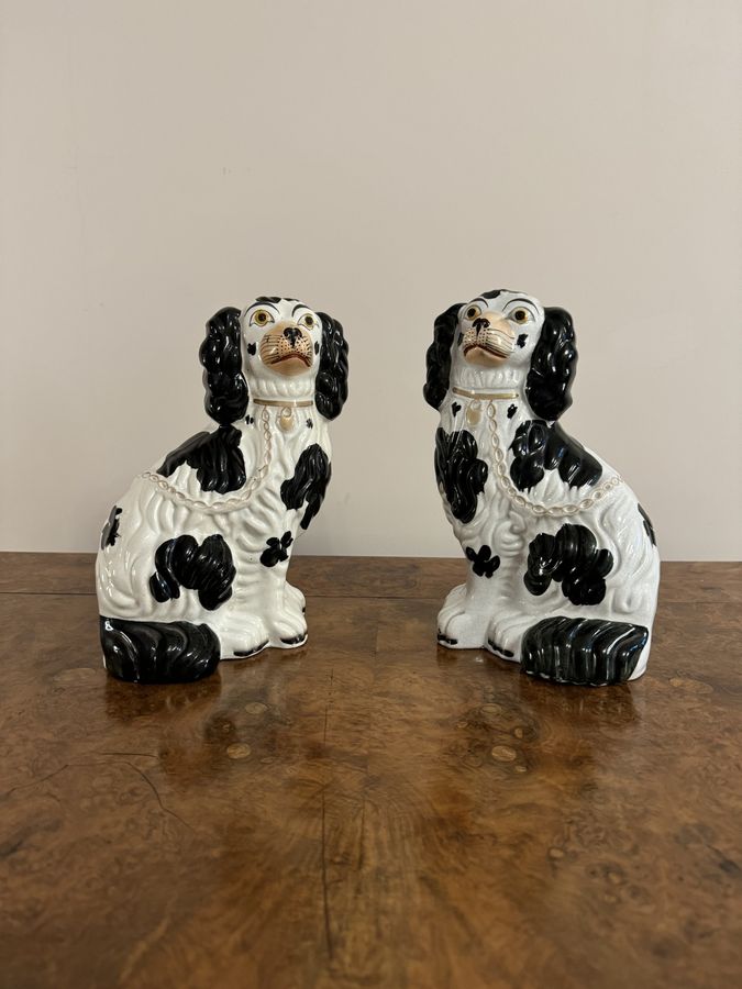 Antique Lovely quality pair of antique black and white Staffordshire dogs 