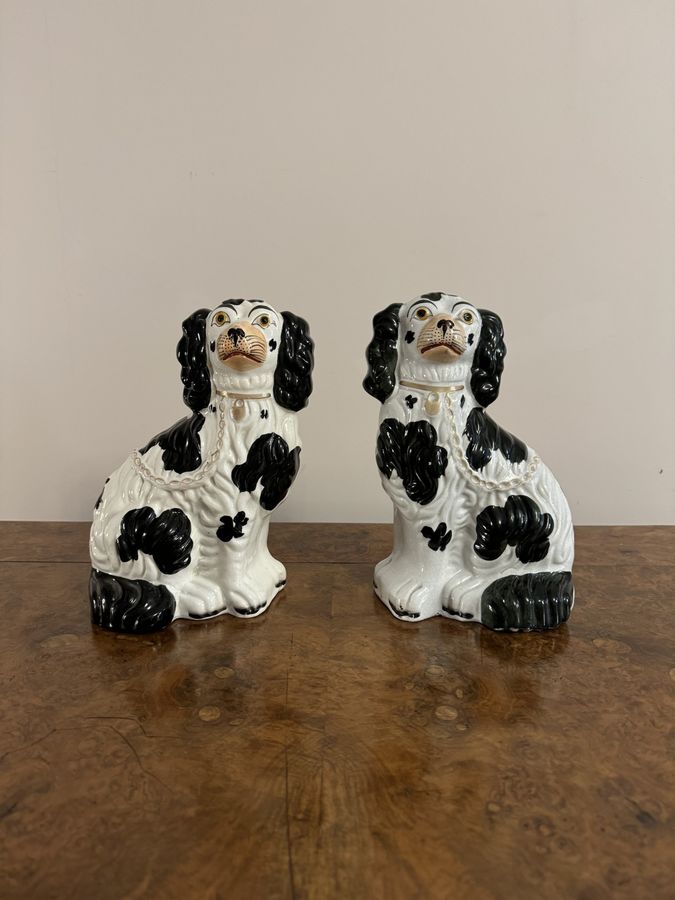 Lovely quality pair of antique black and white Staffordshire dogs