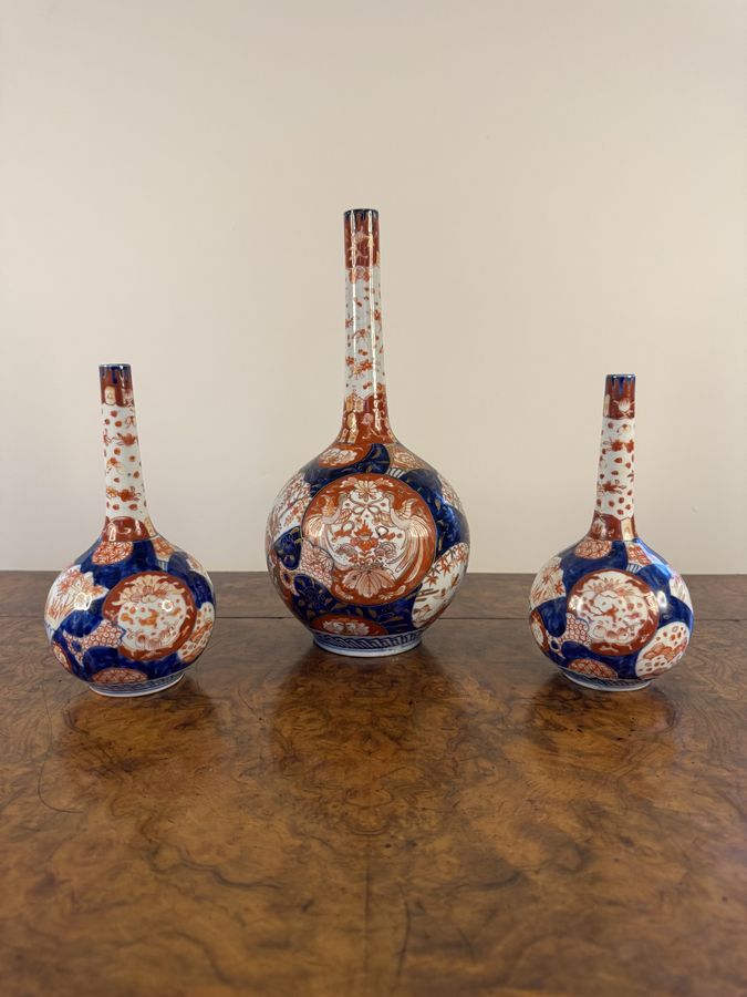 Antique Outstanding quality garniture of three Japanese imari shaped vases