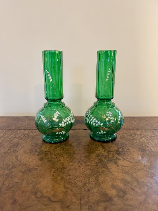 Fine quality pair of antique green glass shaped vases