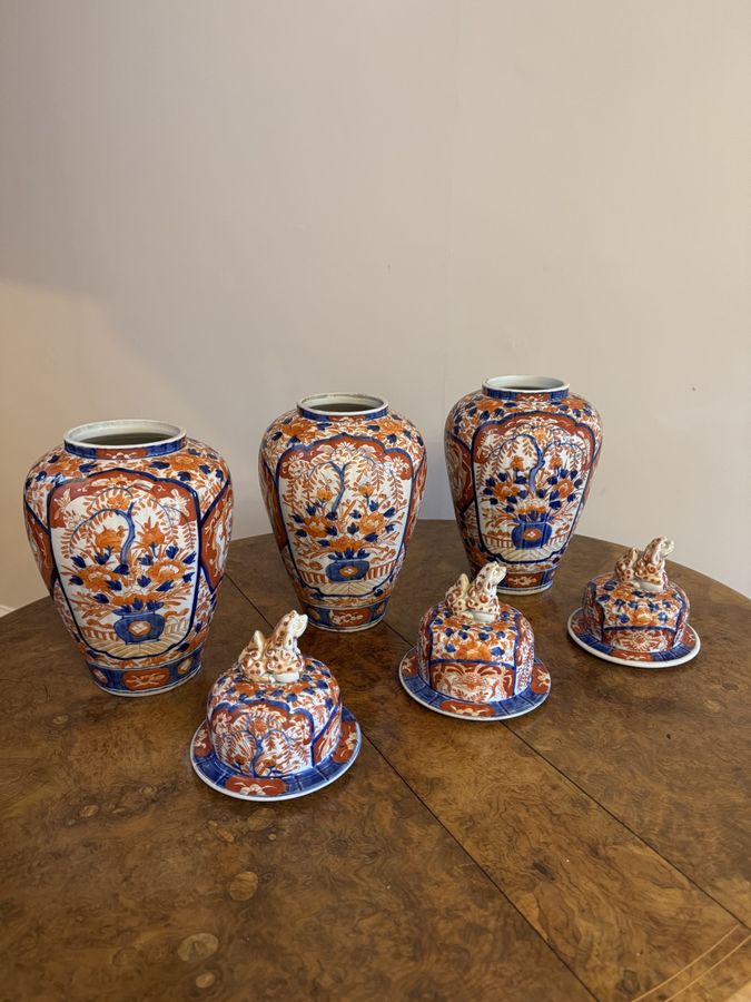 Antique Outstanding fantastic quality garniture of three antique Japanese imari vases and covers