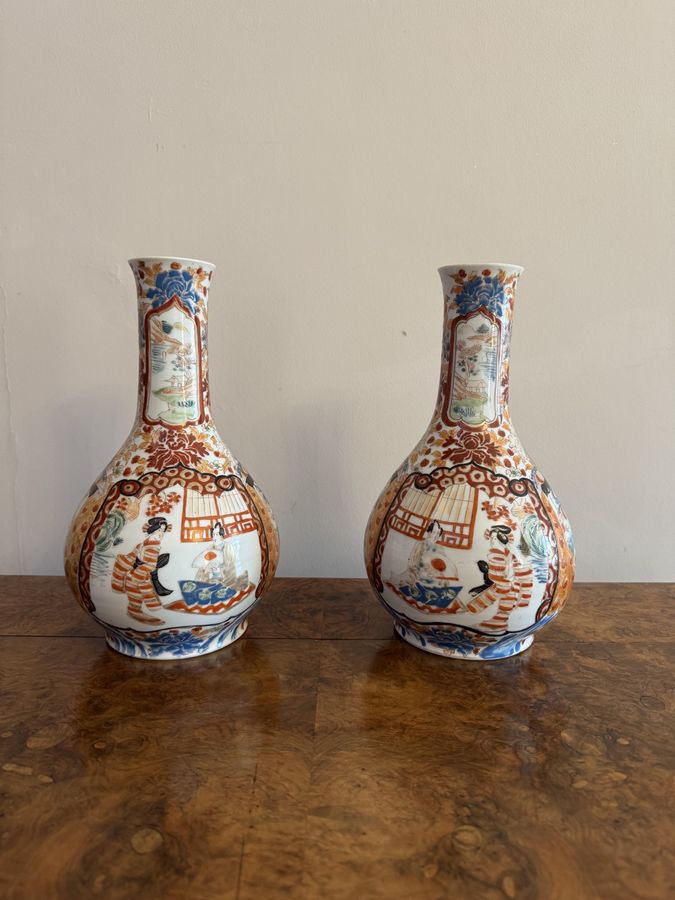 Fine quality pair of antique Japanese imari bottle shaped vases