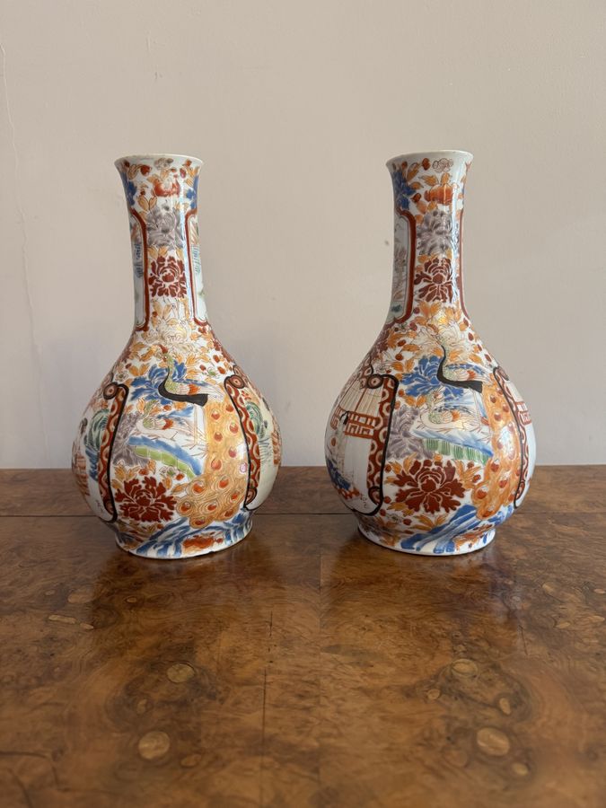 Antique Fine quality pair of antique Japanese imari bottle shaped vases