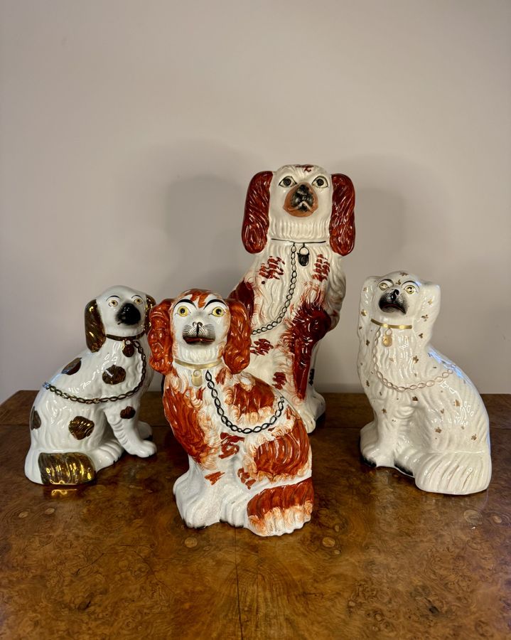 Antique Quality collection of four antique Staffordshire dogs