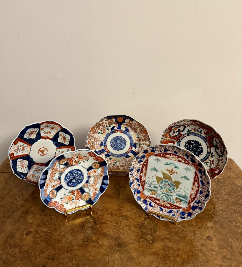 Unusual collection of five antique Japanese imari plates