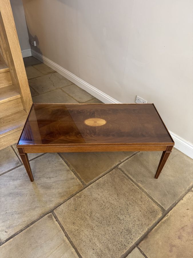 Antique quality figured mahogany inlaid coffee table