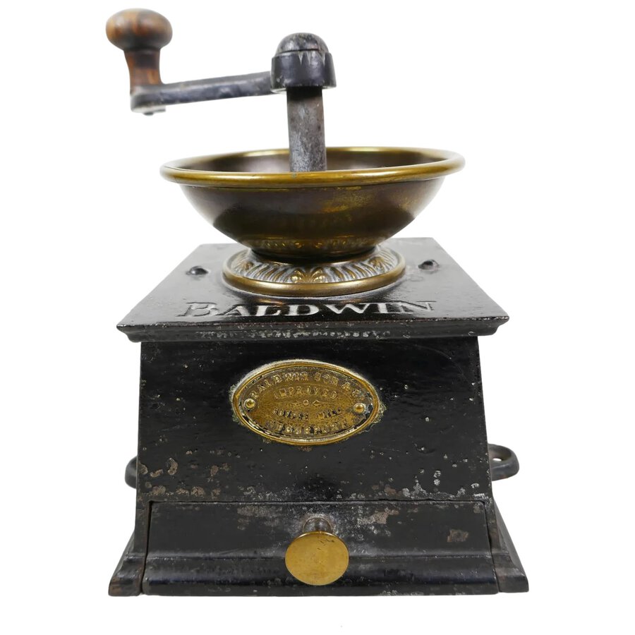 A large Victorian coffee grinder by Baldwin Son and Co
