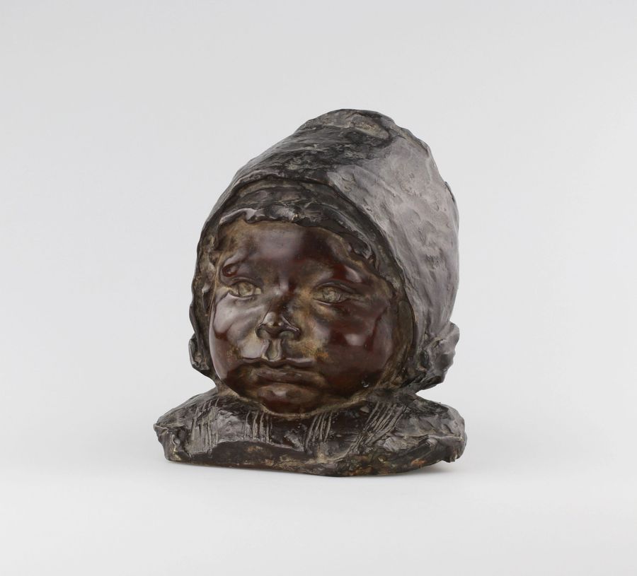 Antique Bronze bust of a girl.