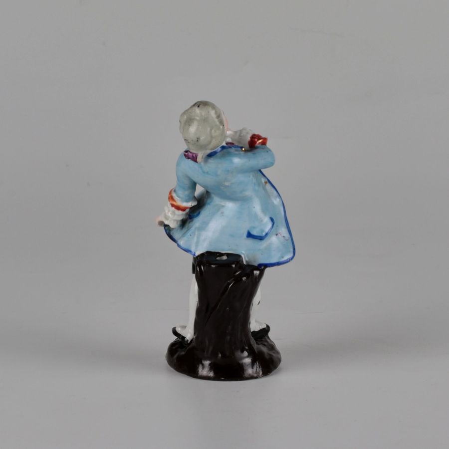 Antique Porcelain figurine of a poet.